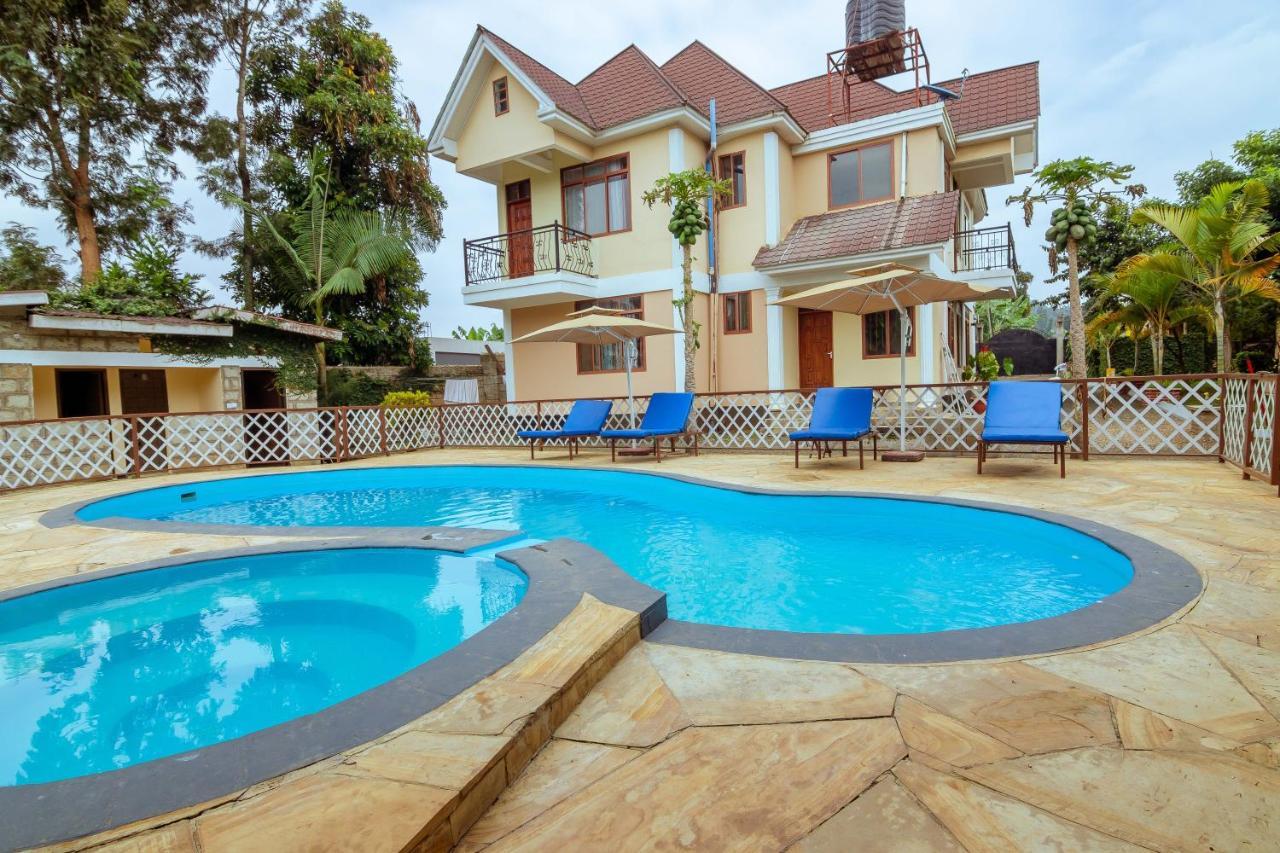 Rayan Apartments & Safaris Arusha Buitenkant foto