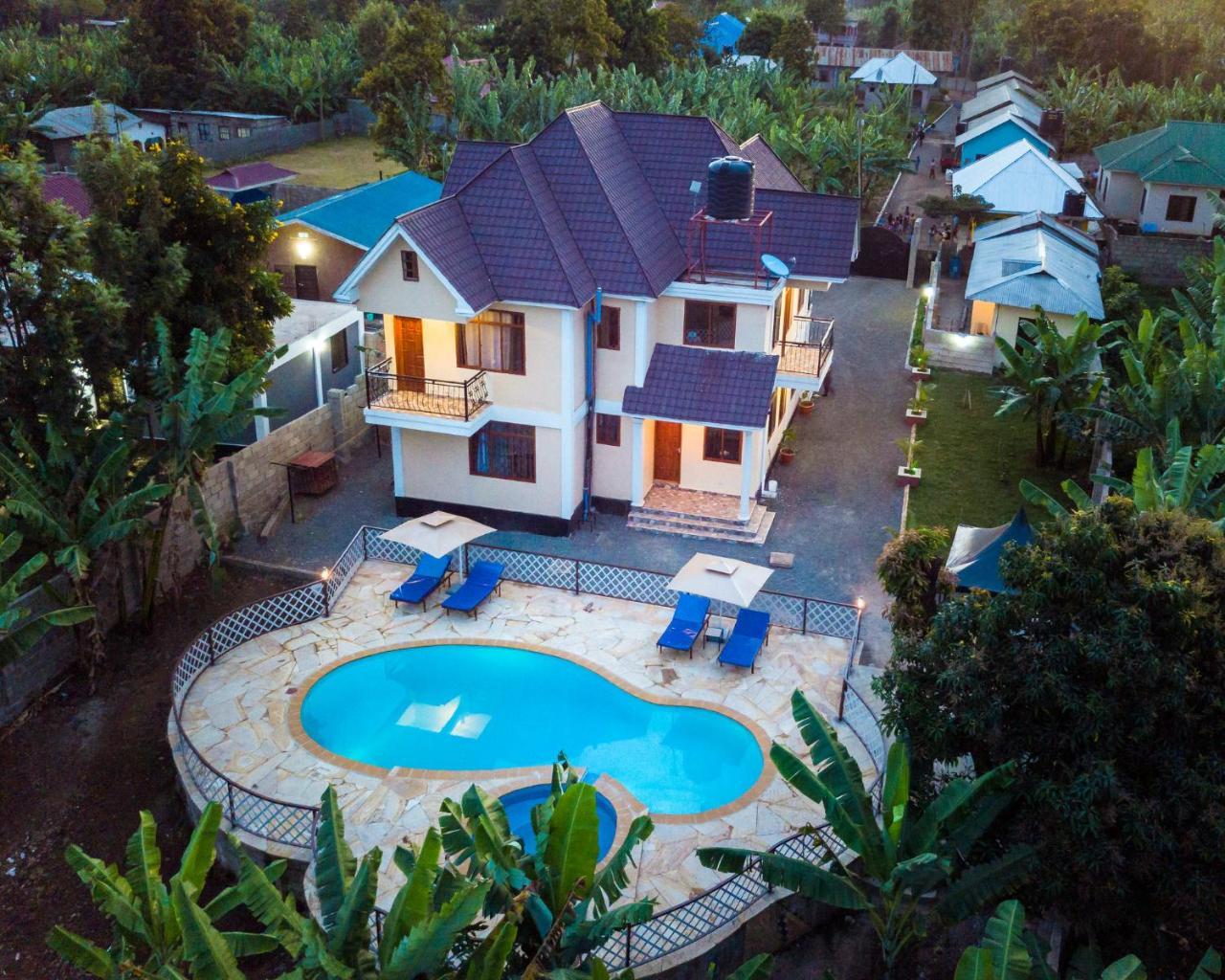 Rayan Apartments & Safaris Arusha Buitenkant foto