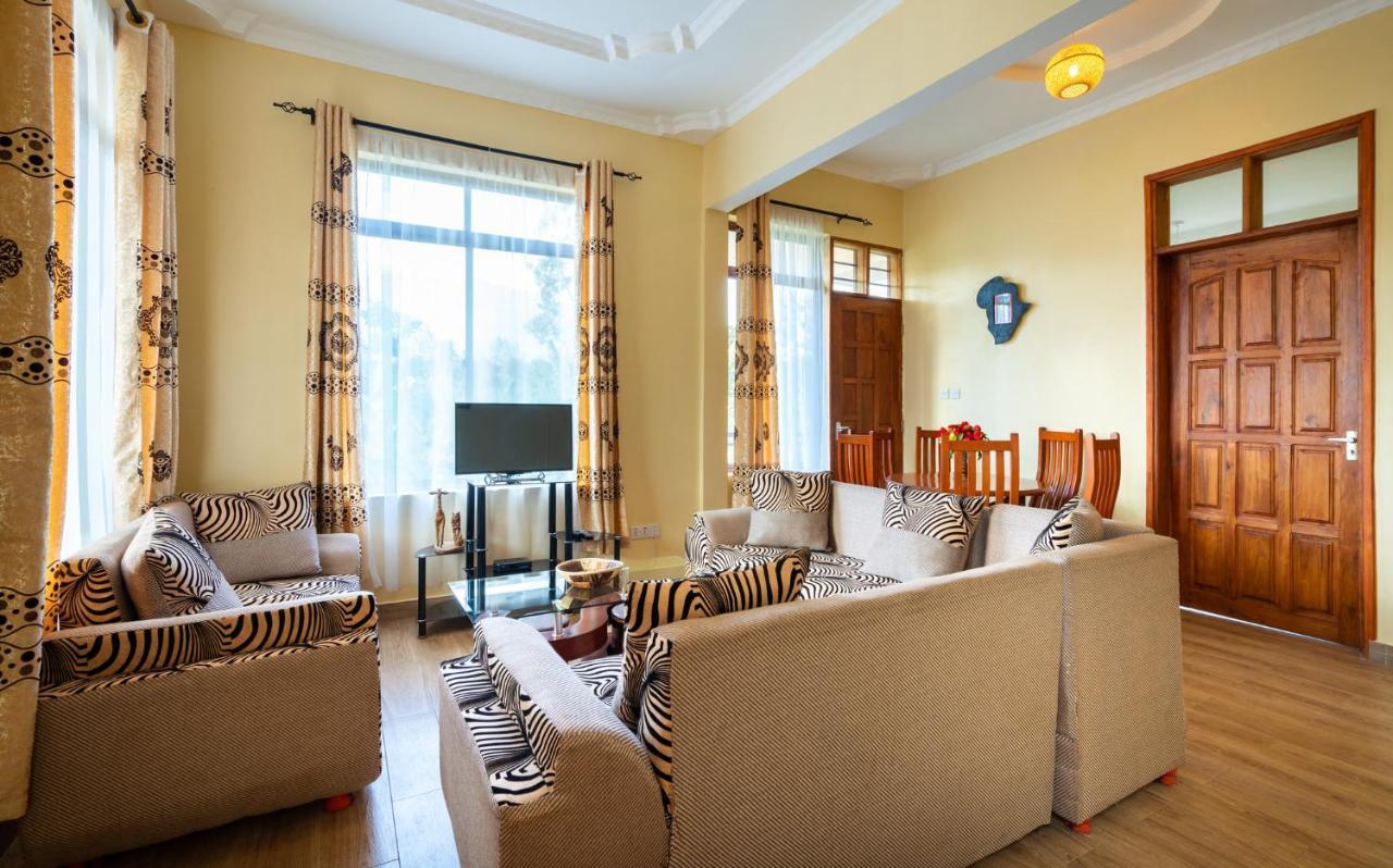 Rayan Apartments & Safaris Arusha Buitenkant foto