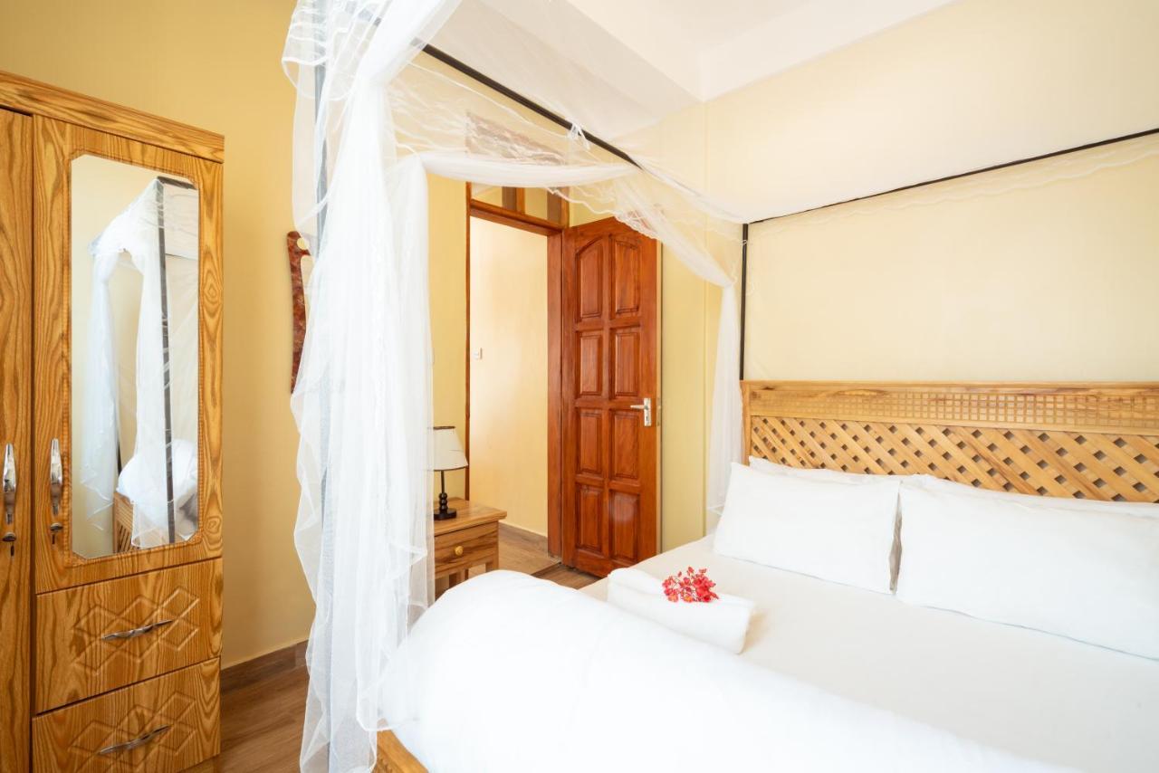 Rayan Apartments & Safaris Arusha Buitenkant foto